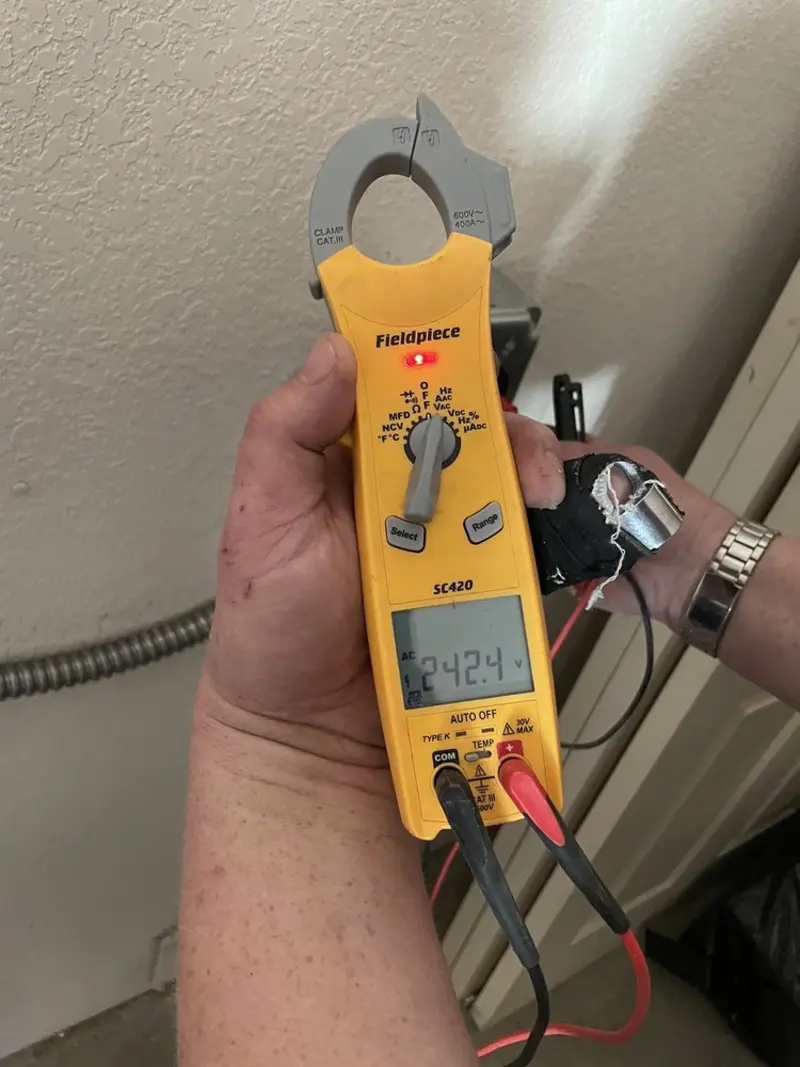 Voltage testing with clamp meter during Generator Installation in Roselawn
